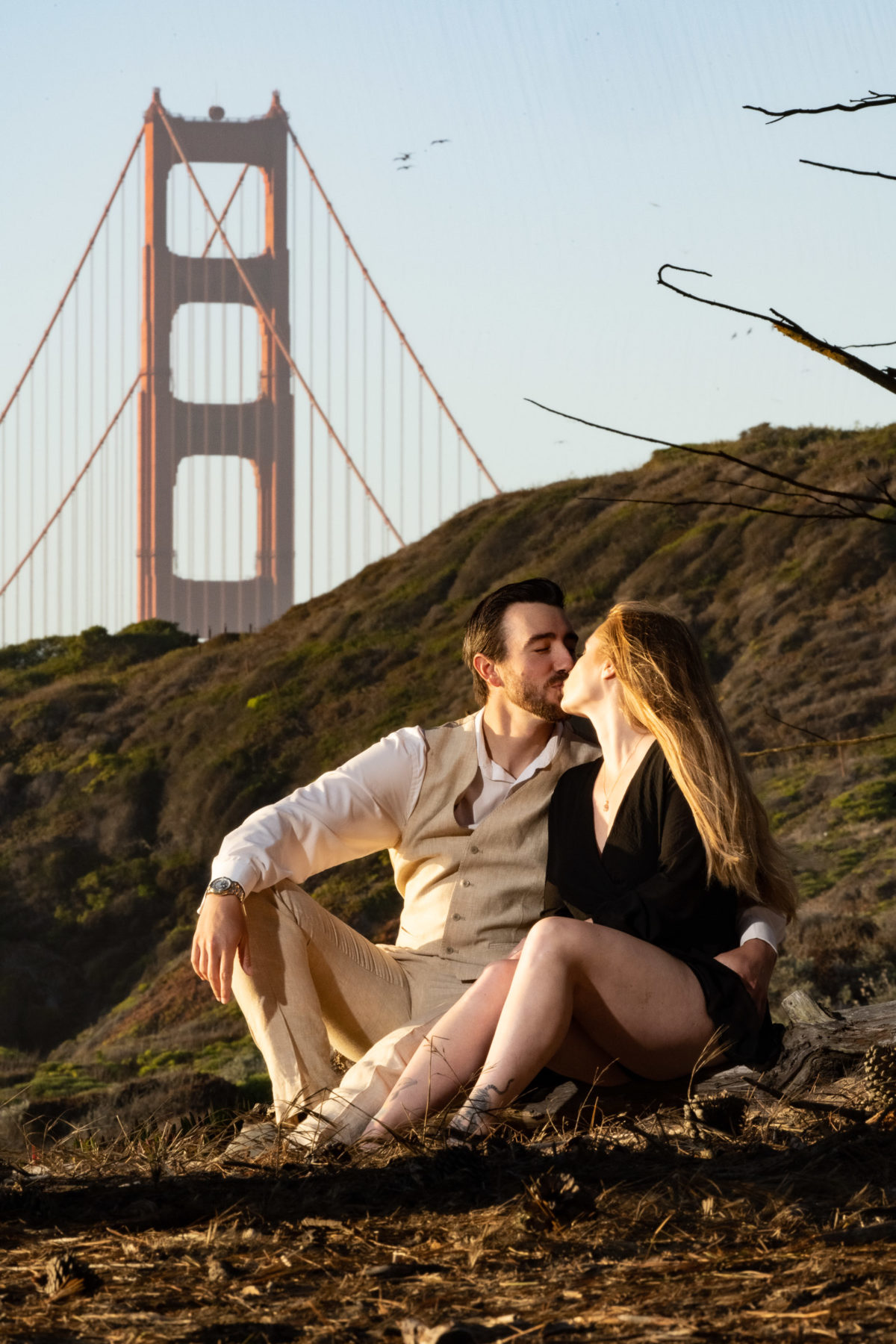 Couple with Golden Gate Bridge