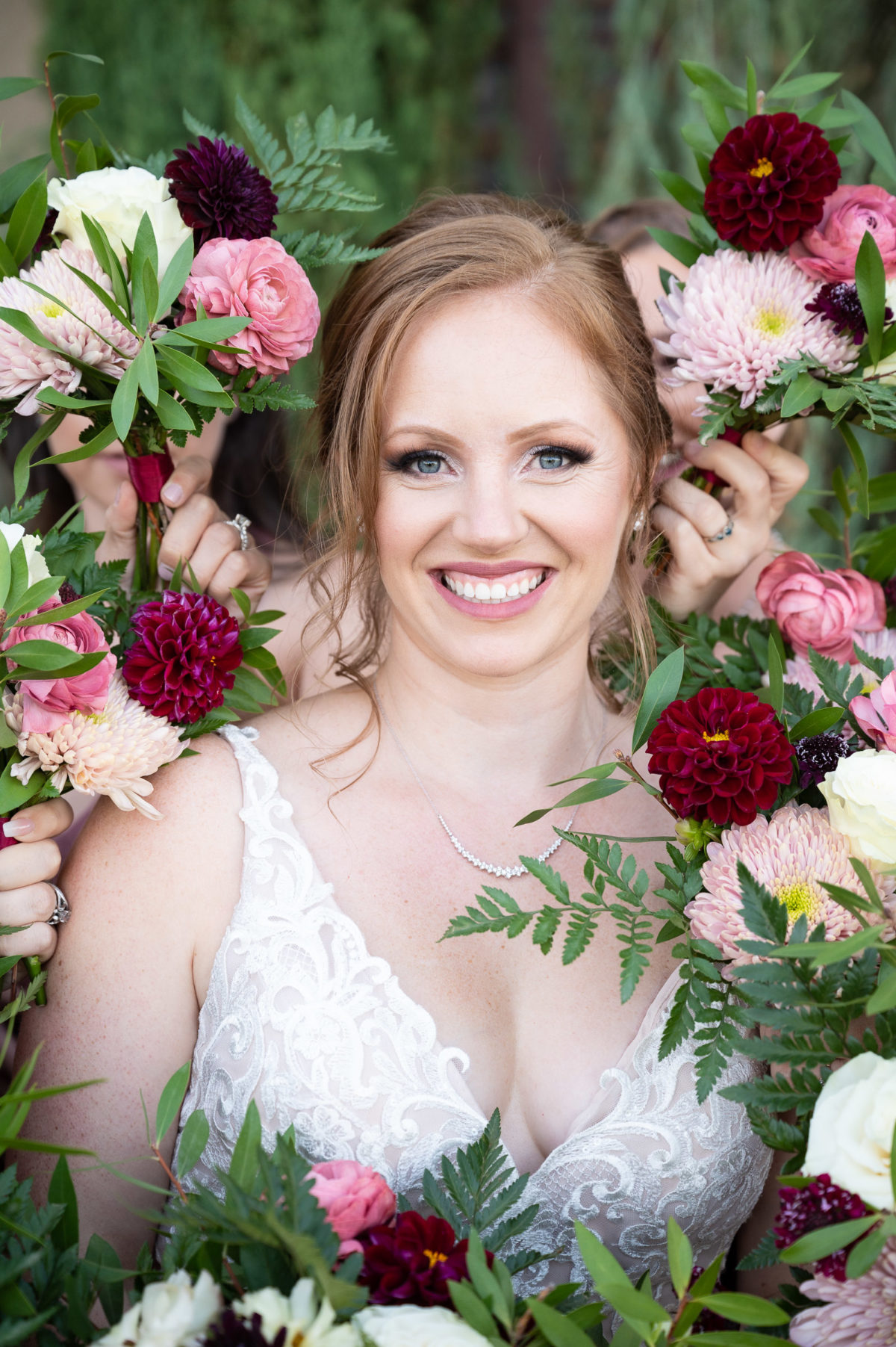bride surrounded with flowers
