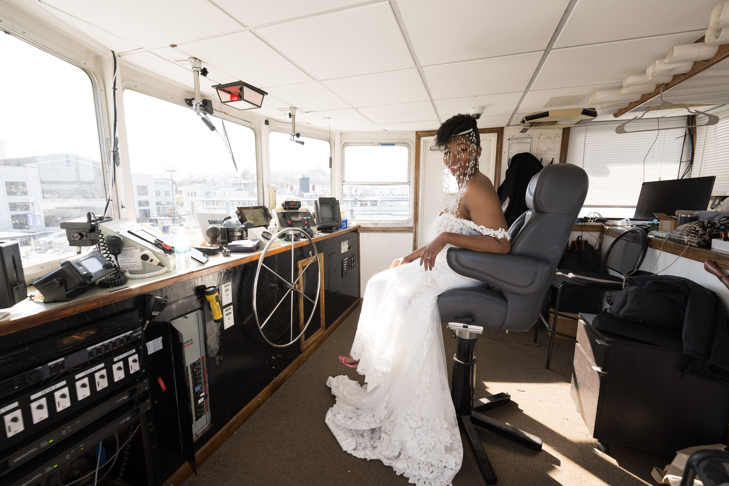 bride in hornblower sf empress cabin captain's chair