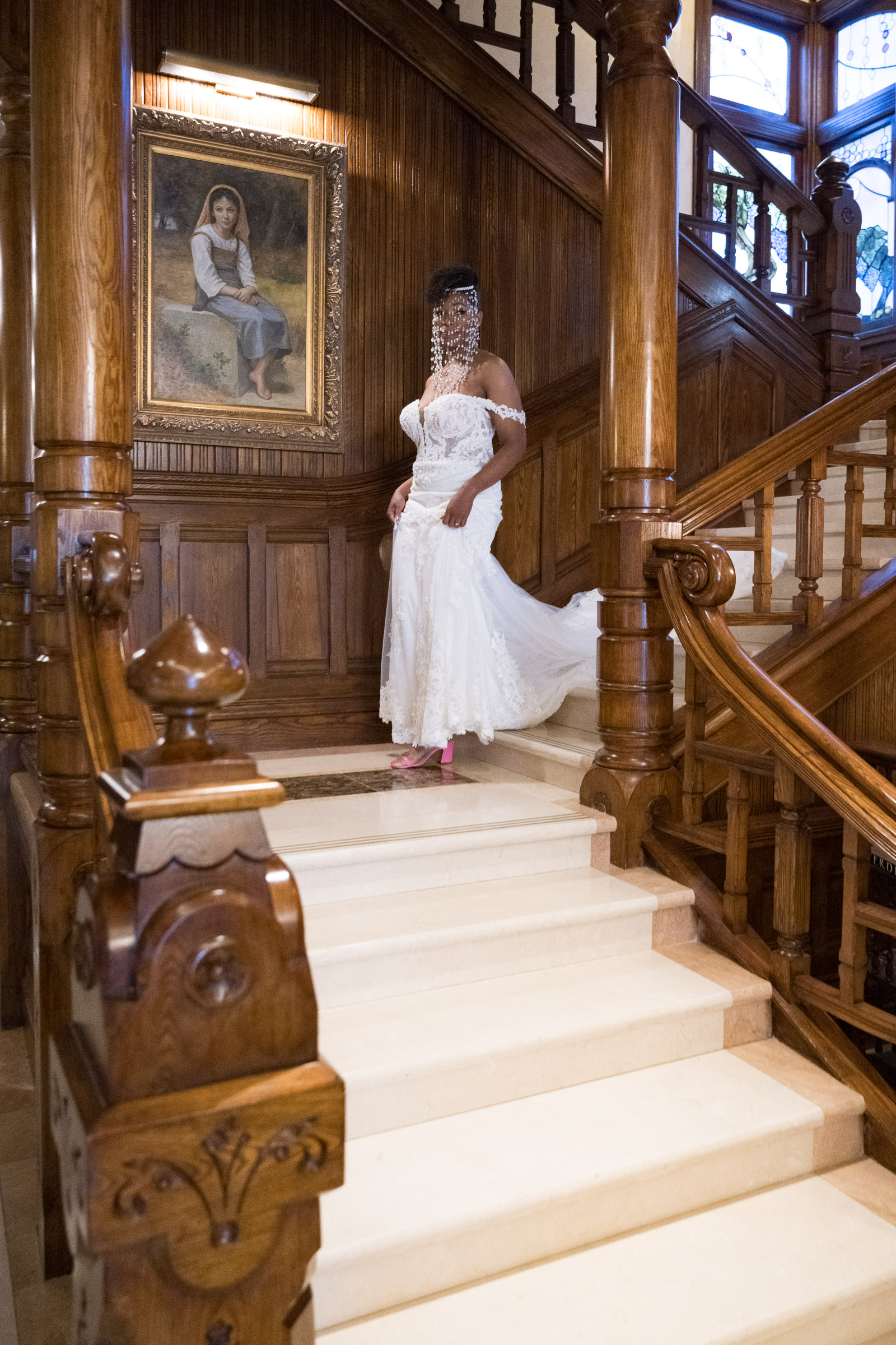 bride portrait staircase mansion