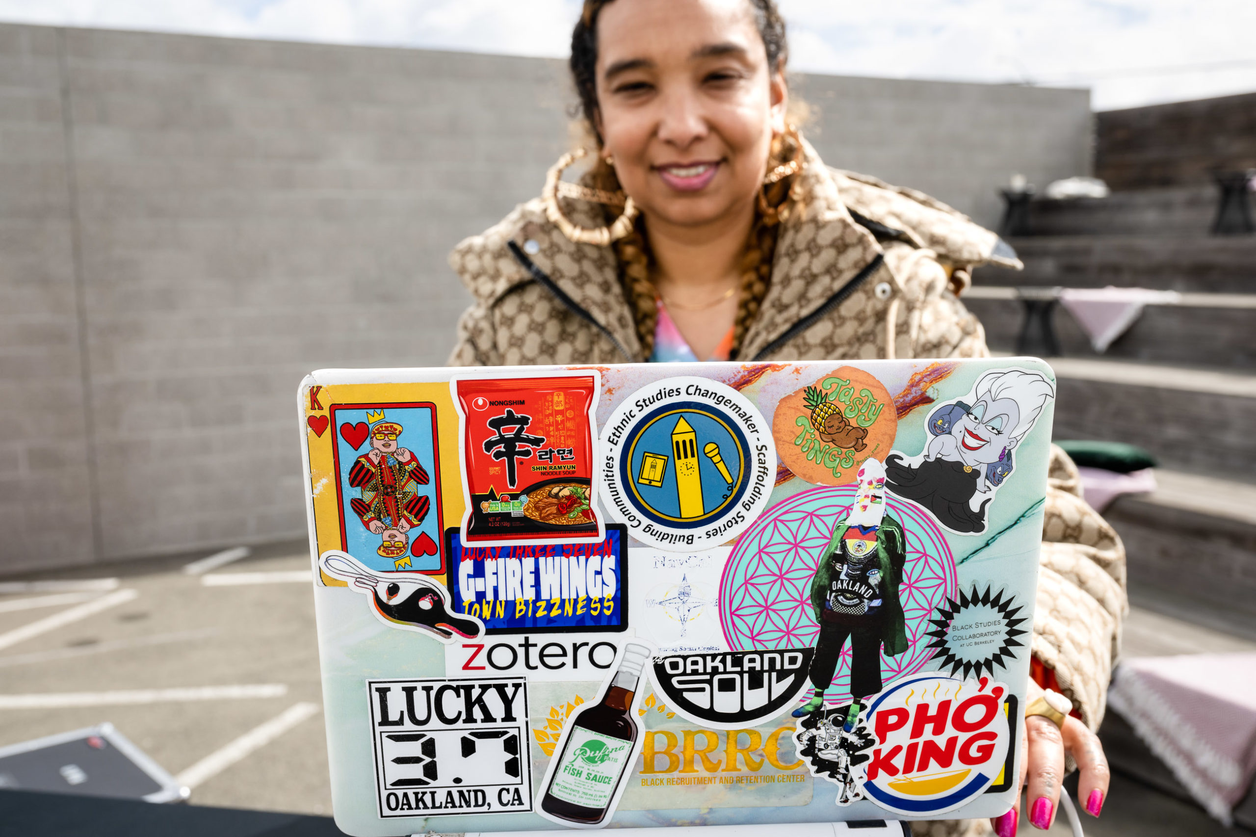 DJ with laptop stickers
