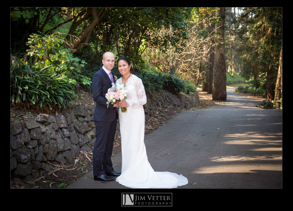 Bride & Groom on the walking path in Stern Grove