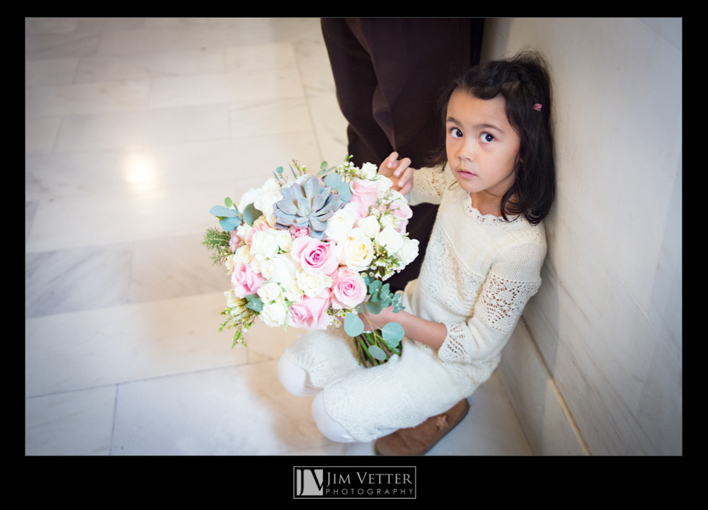 Flower girl guarding the flowers.