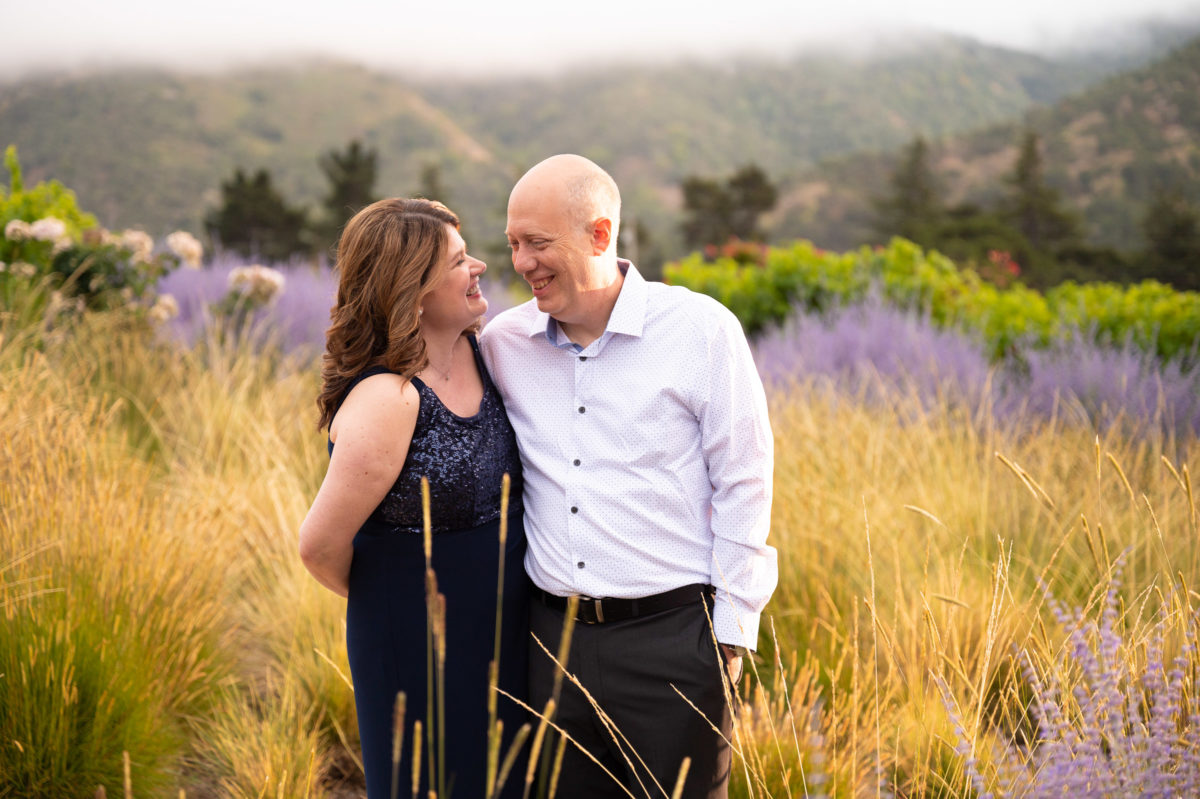 bride and groom in lavendar field