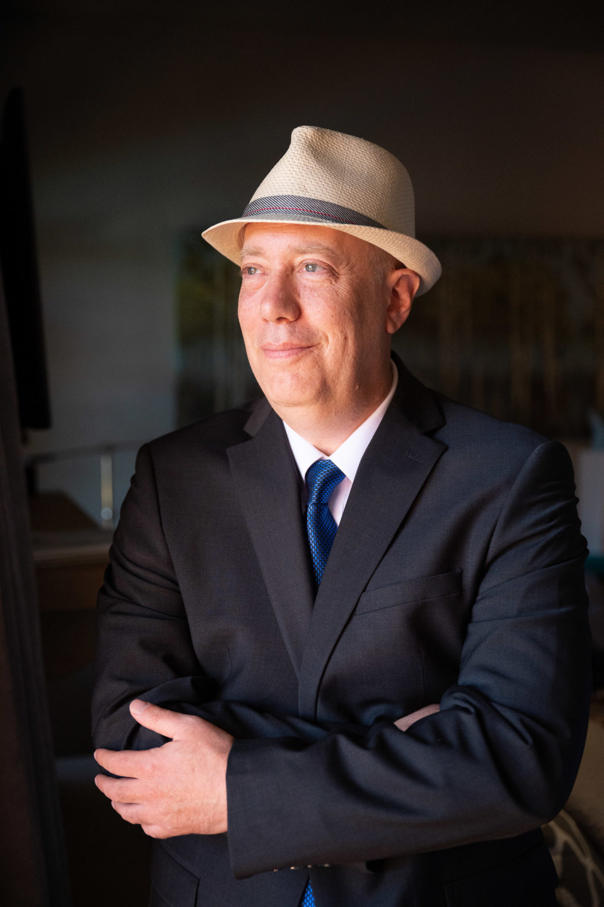 groom portrait in hat