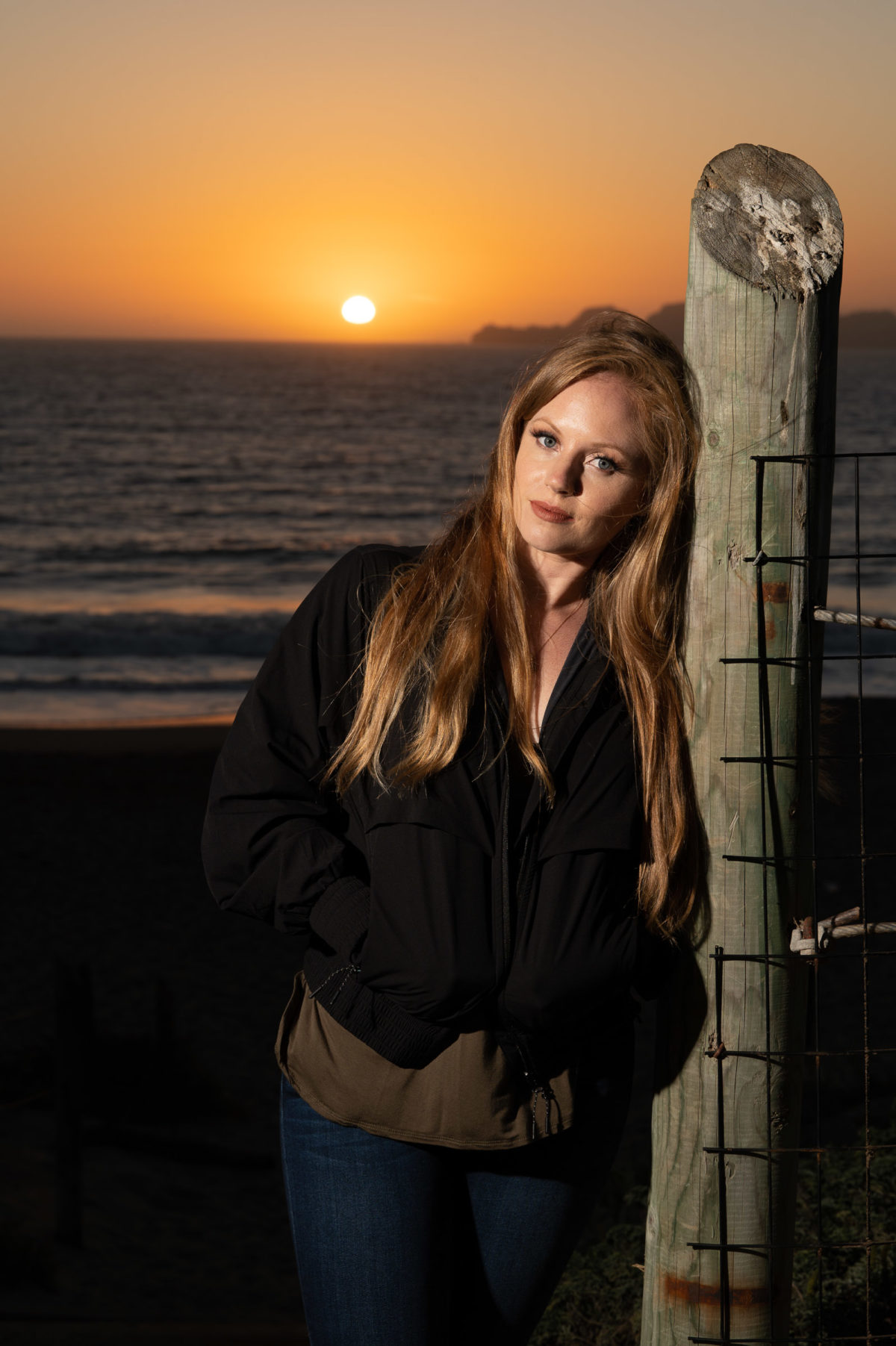 woman beach sunset long hair