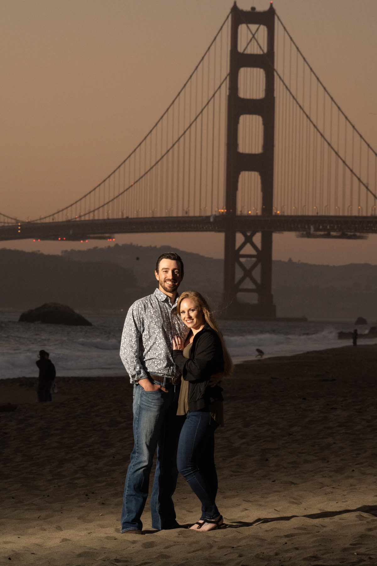 Couple with Golden Gate Bridge