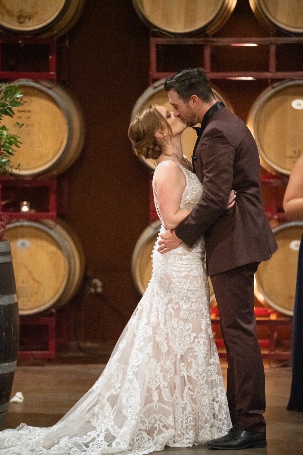 bride and groom first kiss