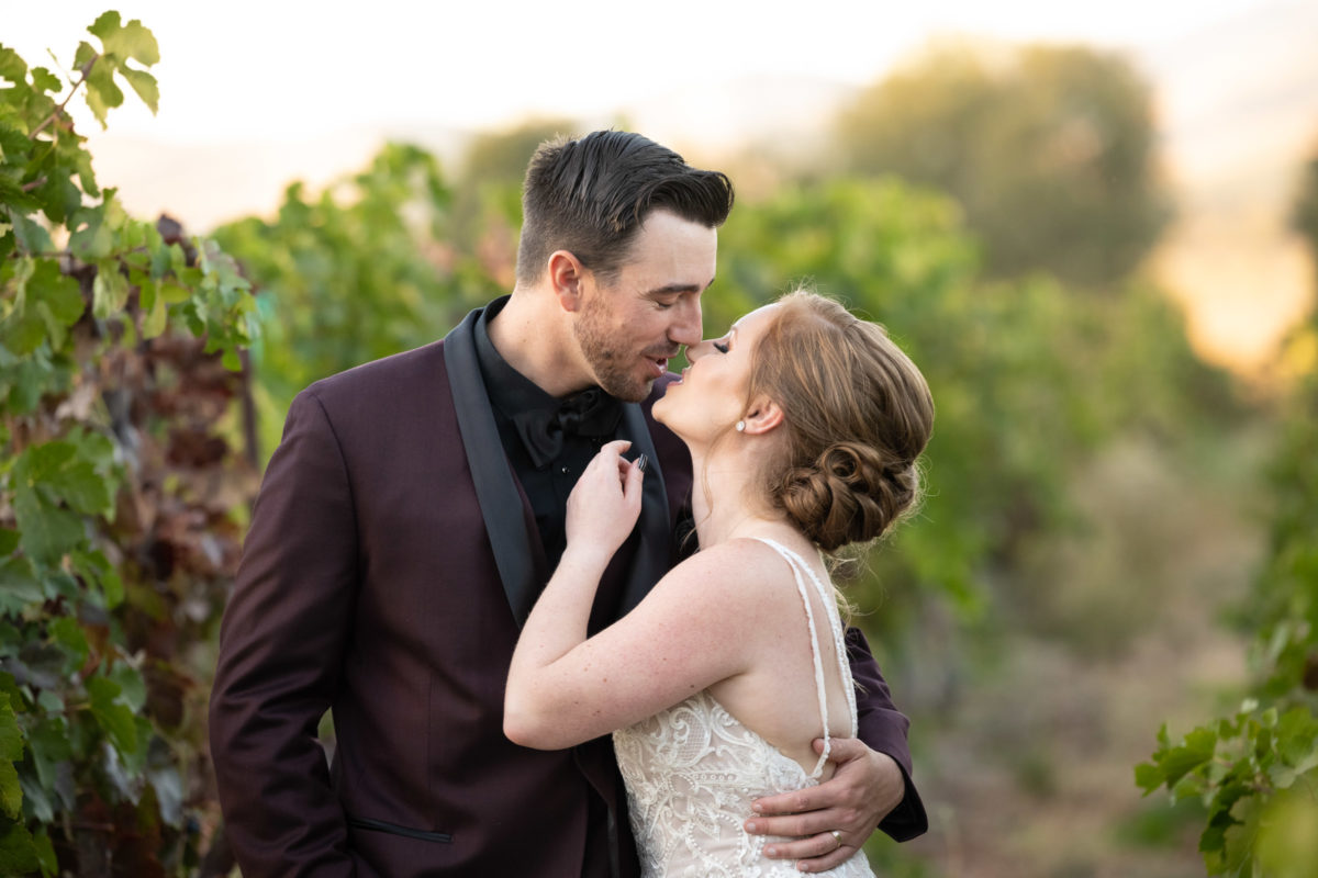 bride and groom vineyard portrait