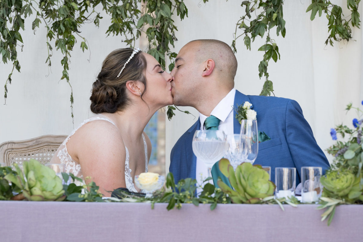 bride and groom kissing