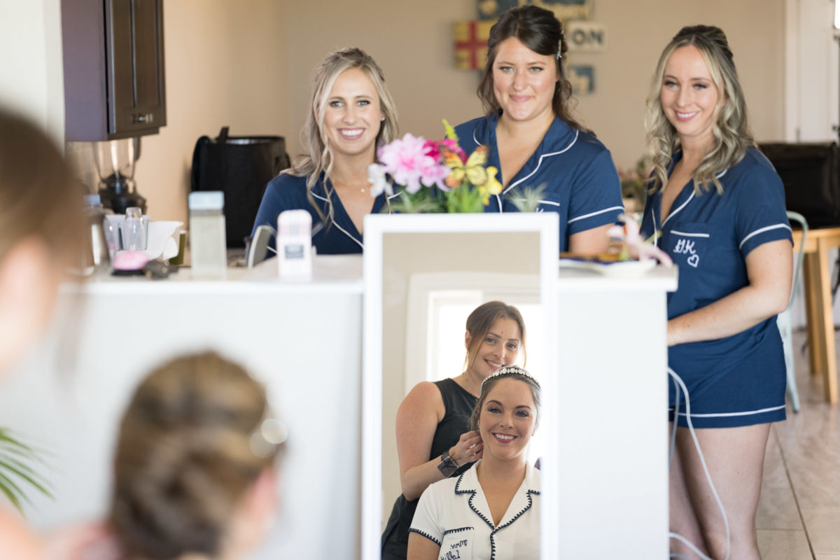 bride and bridesmaids getting ready