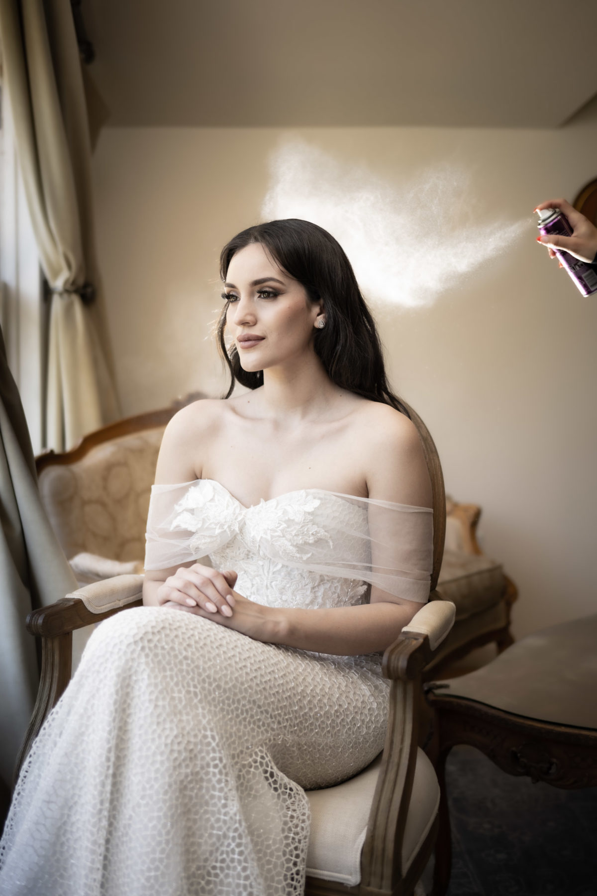 bride getting hairspray