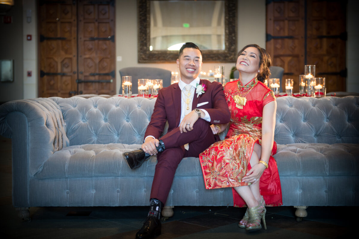 a man and a woman sitting on a couch.