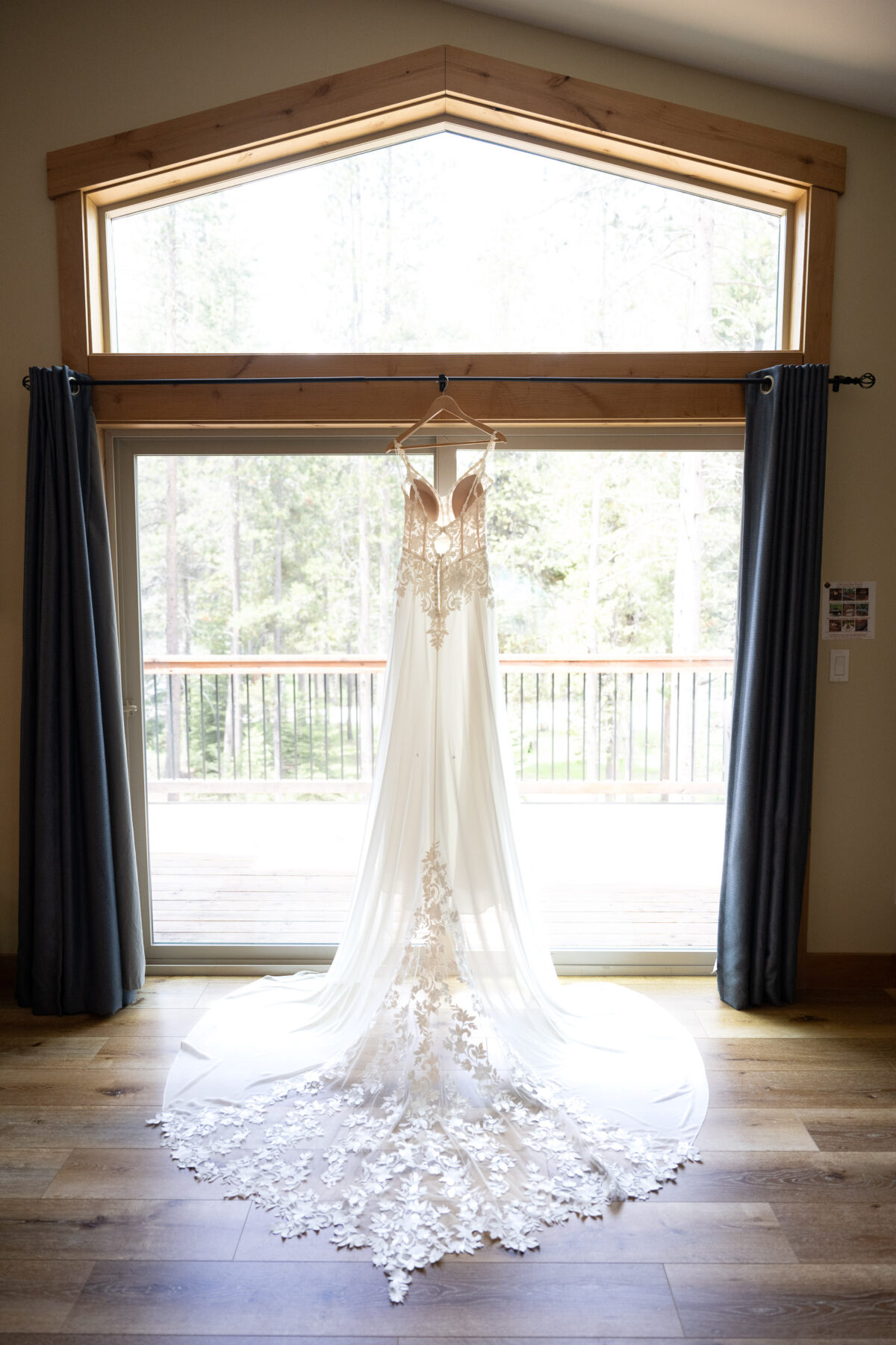 wedding dress haning in window