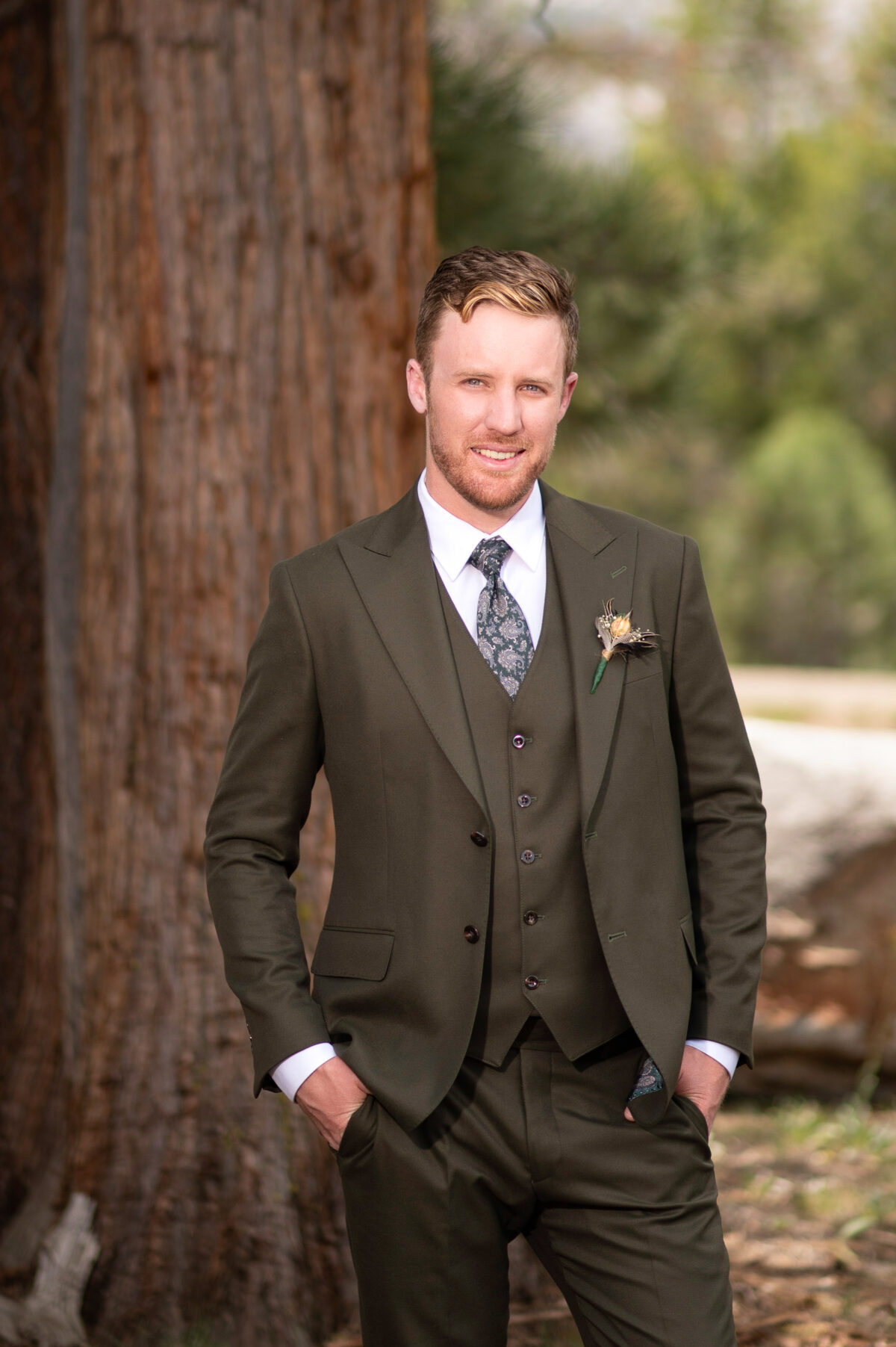 groom portrait in woods